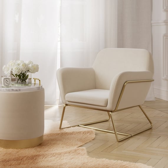 charles cream velvet armchair lara pouffe room shot