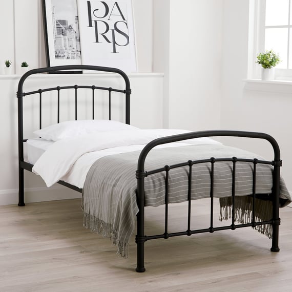halston black single metal bed light room shot