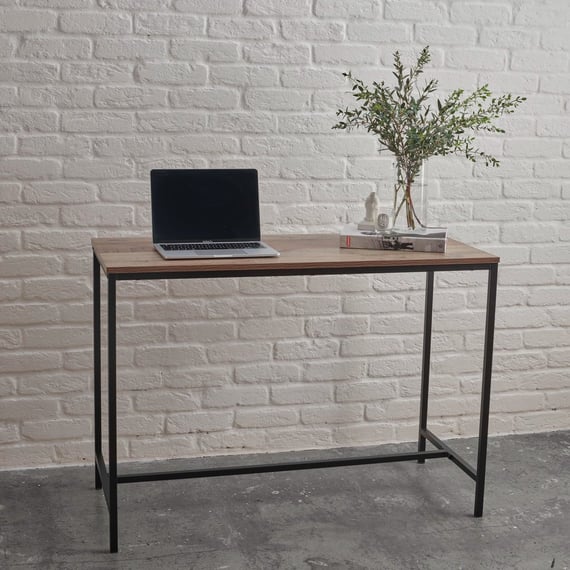 hoxton industrial desk laptop brick wall lifestyle