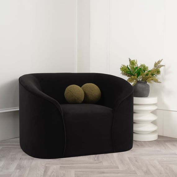 zuma black velvet sofa styled room